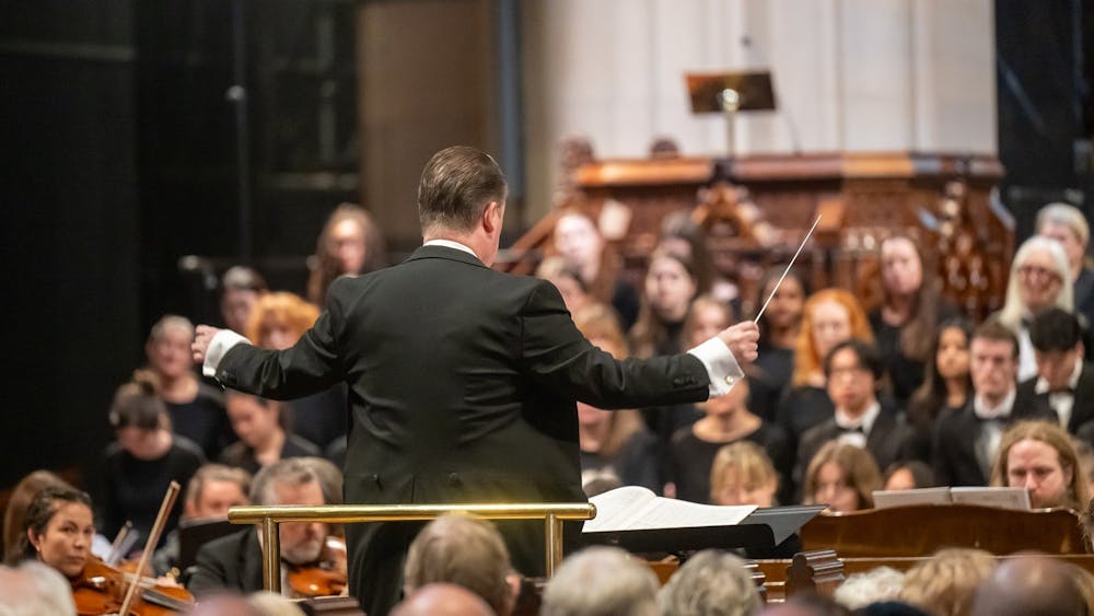 Andrew Wales conducts the RMP Choir and Orchestra