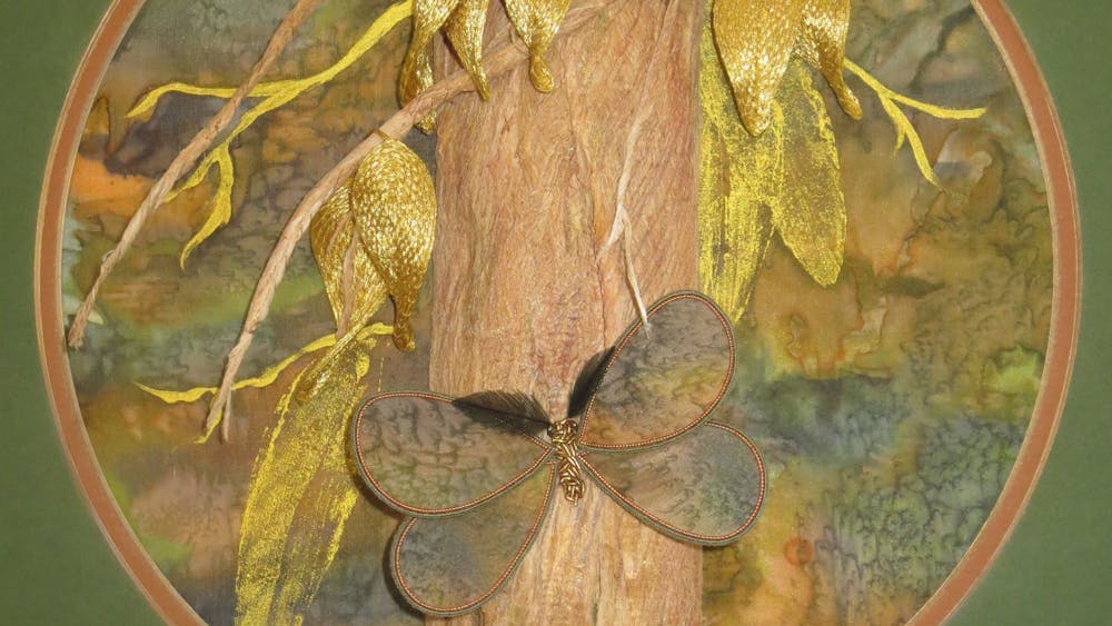 Bushland embroidery with butterfly