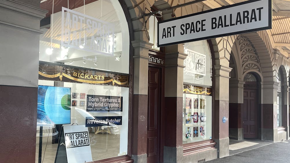 Street frontage view of Art Space Gallery with large windows and signage.