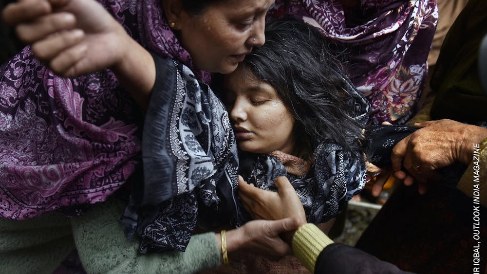 Sanam Bashir (21) collapses with grief at her mother’s funeral.