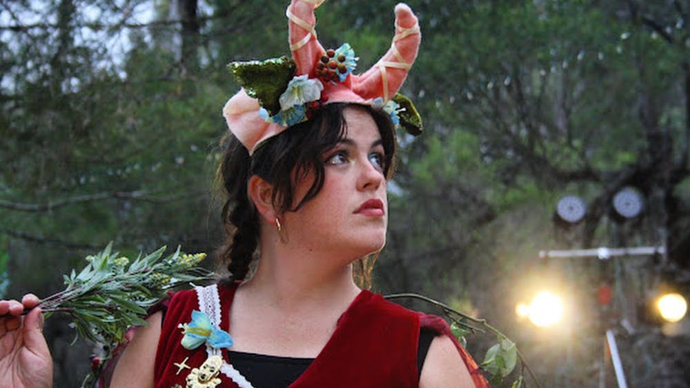 Puck from "A Midsummer Night's Dream" looking off in the distance
