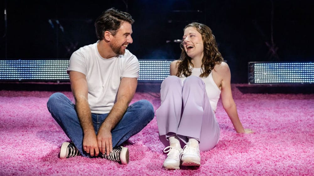 Karin McCraken and Simon Leary hanging out and laughing