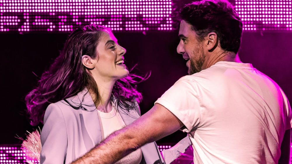 Karin McCracken and Simon Leary playfully flirting