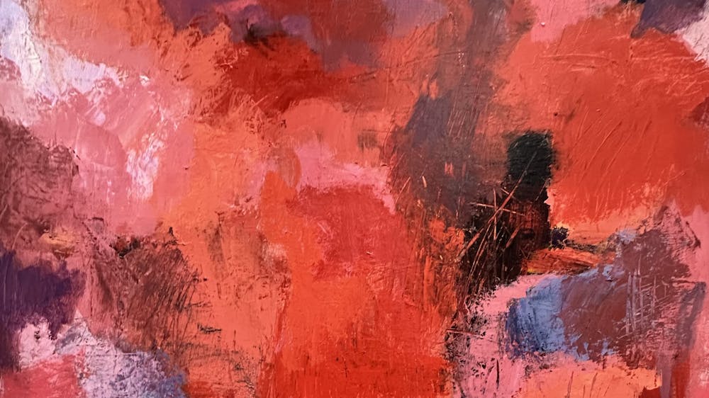 Abstract painting of rich red colours