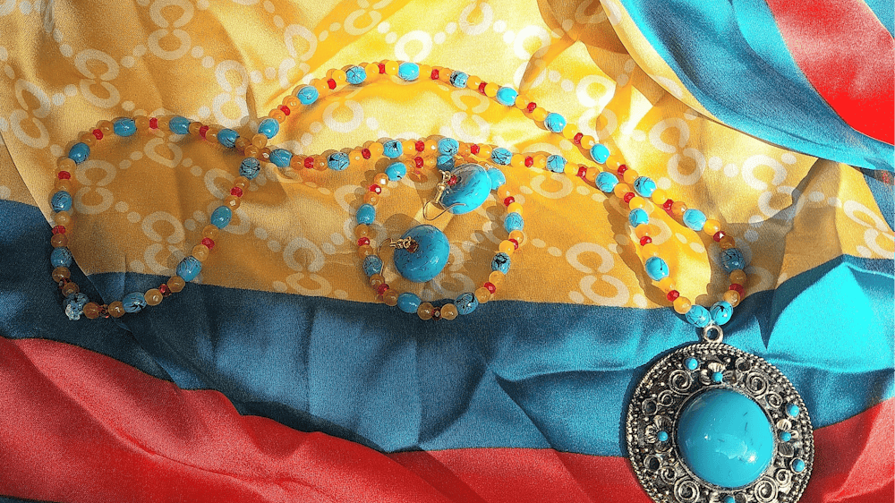 Scarves designed by Amna  plus jewelery  to match.
