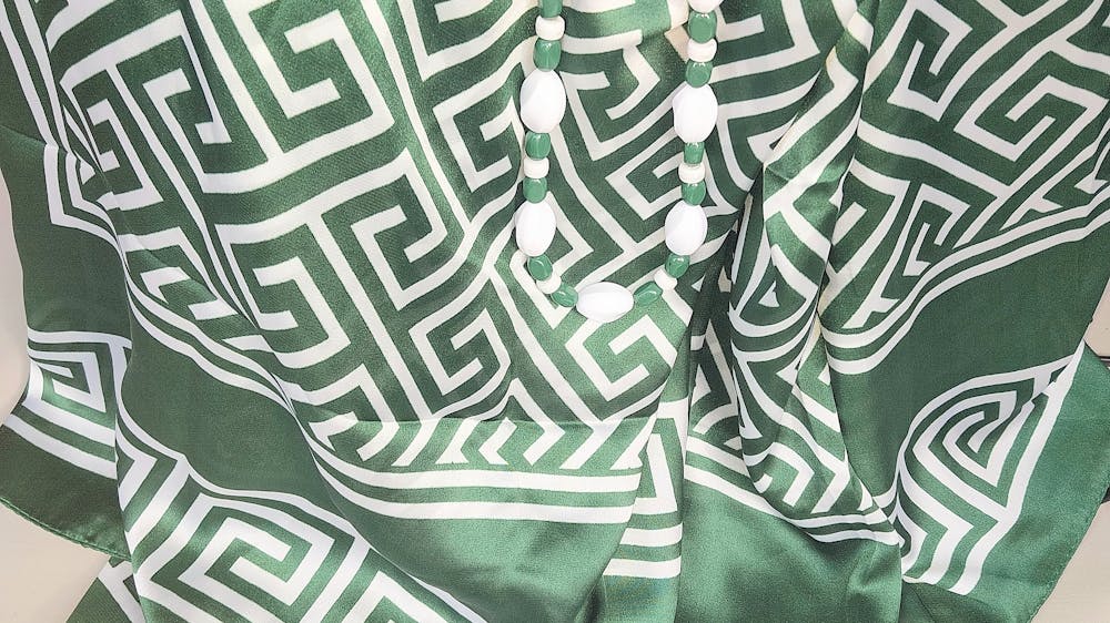 Green and white scarf with matching jewellery