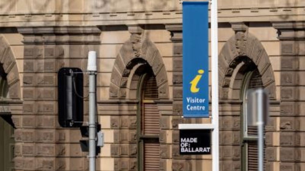 Facade of Town Hall with accreditation banner