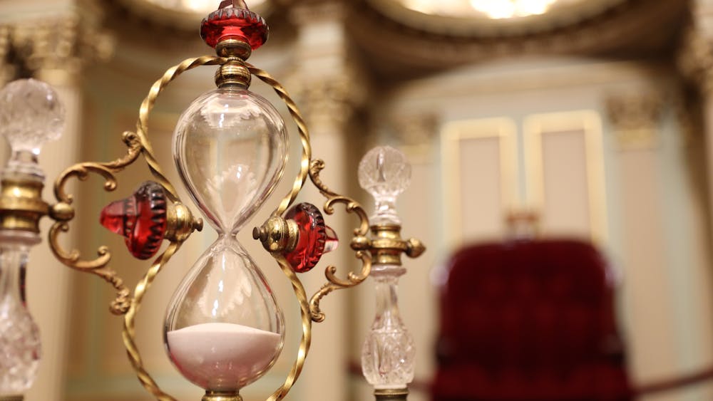 Ornate sandglass from the Legislative Council chamber. Parliament of Victoria.