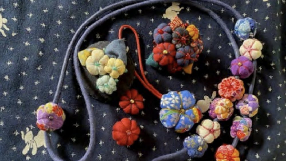 Flower Brooches/Necklace by Andrea Taylor