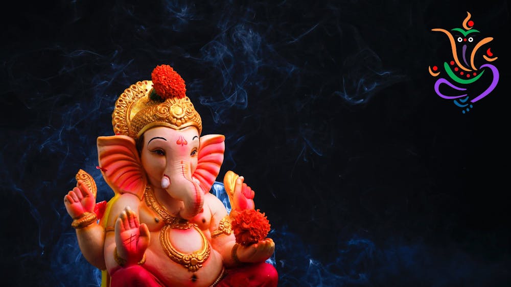 the hindu deity Ganesh against a black background