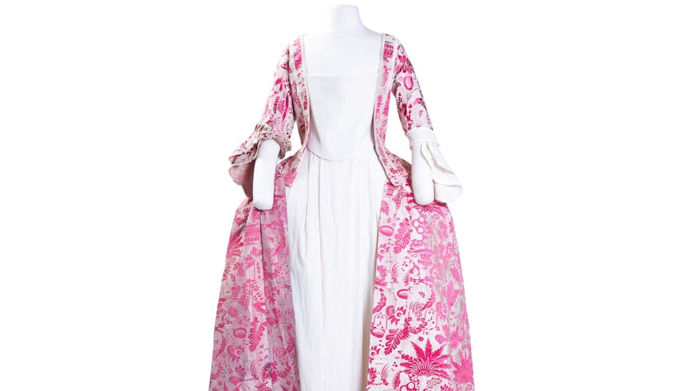 Pink and white 17th century dress on a mannequin