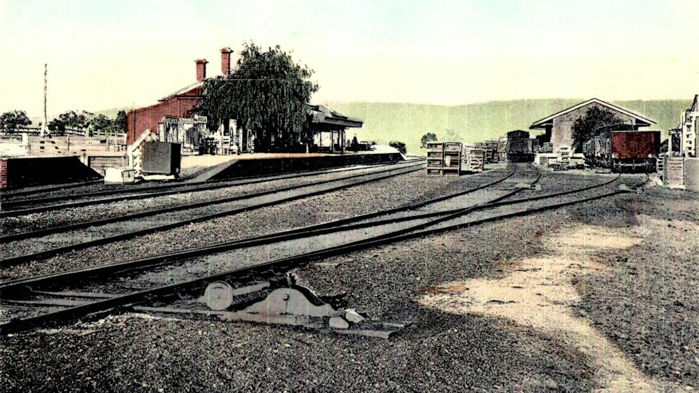 This is a color image of the Avoca Railway Station highlighting the station, Goods Shed and lines
