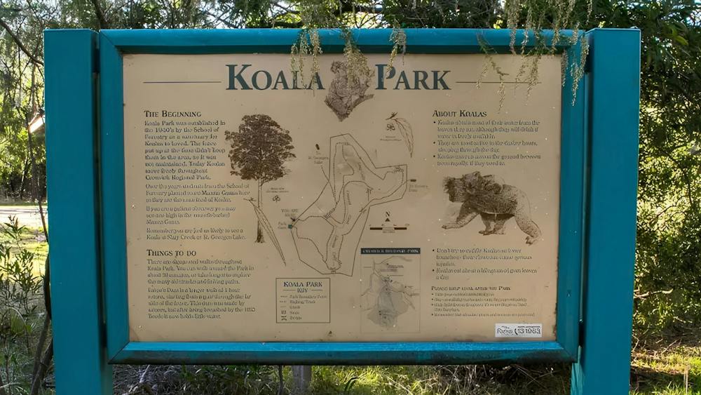 Large interpretation sign with infographics and written copy talking to the history of Koala Park
