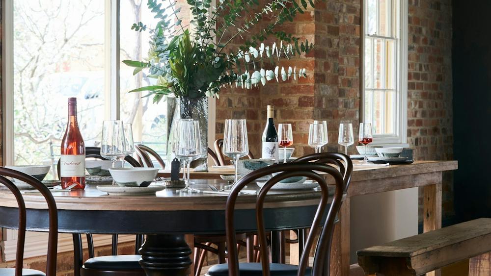 Cosy dining with wine looking out over the garden