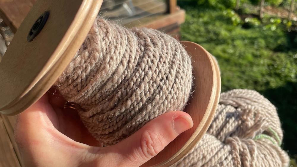 handspun wool on bobbin