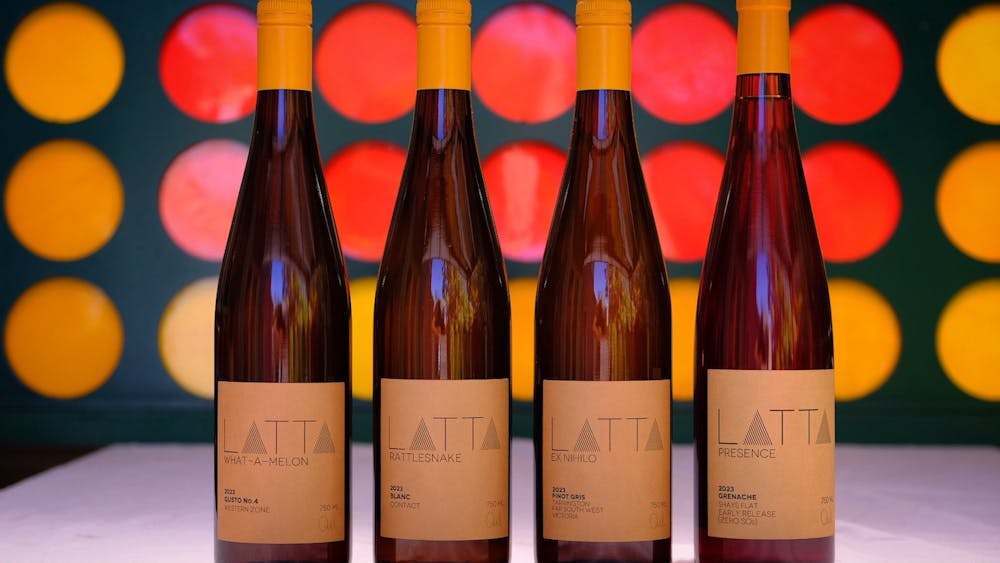 Connect with Latta Wines - Latta wine bottles with a connect four back drop