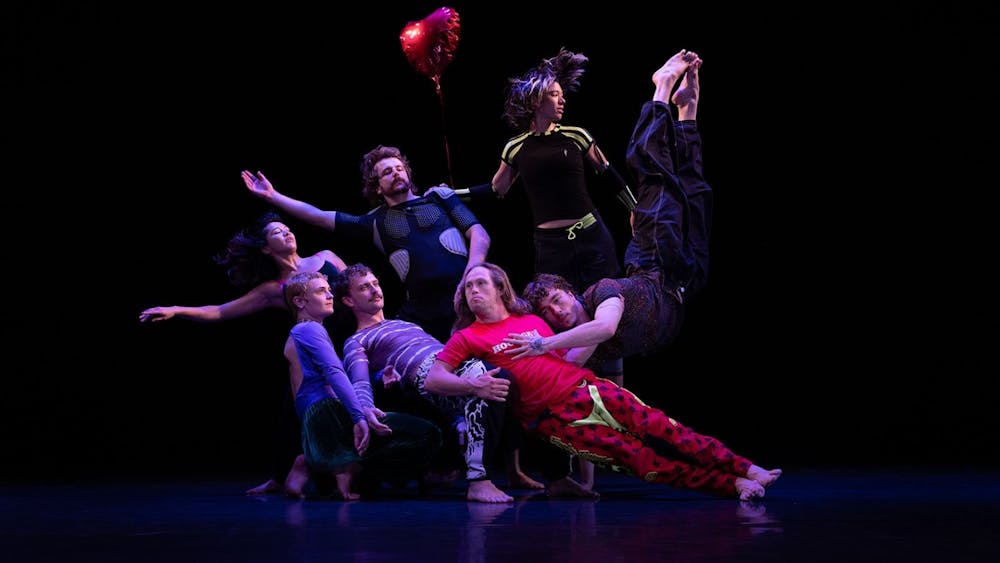 The Dancenorth Ensemble striking a vivid pose