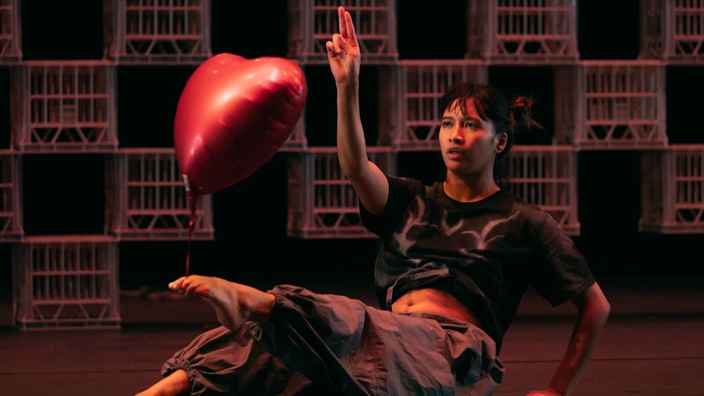 Dancenorth Dancer playing with a heart shaped balloon