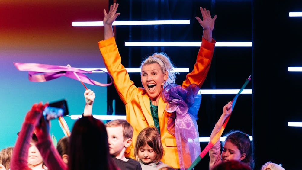 Sugar Rush throwing her hands in the air