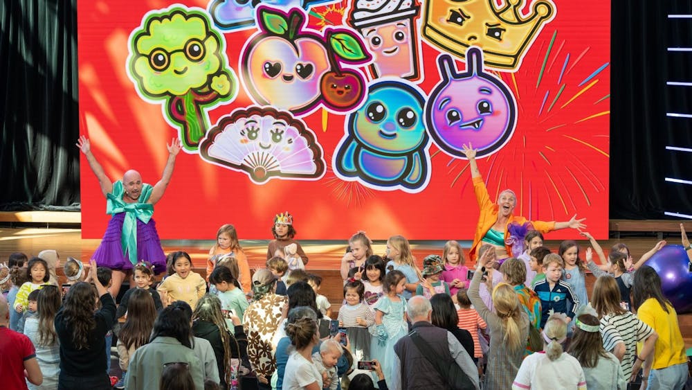 Play Date on stage at Fed Square with a crowd of happy kids