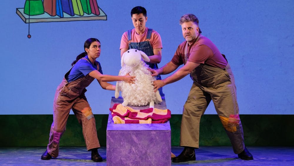 Puppeteers operating the White Sheep