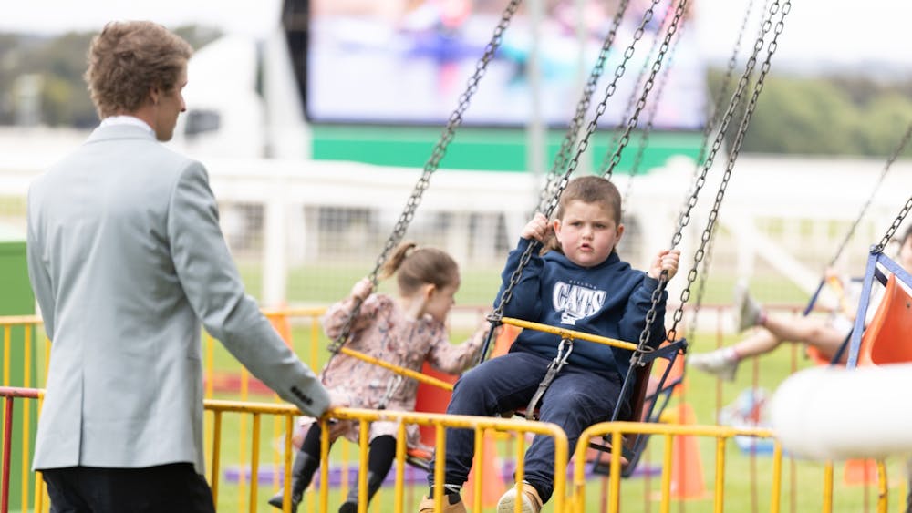 A young kid enjoying a kids activity on course