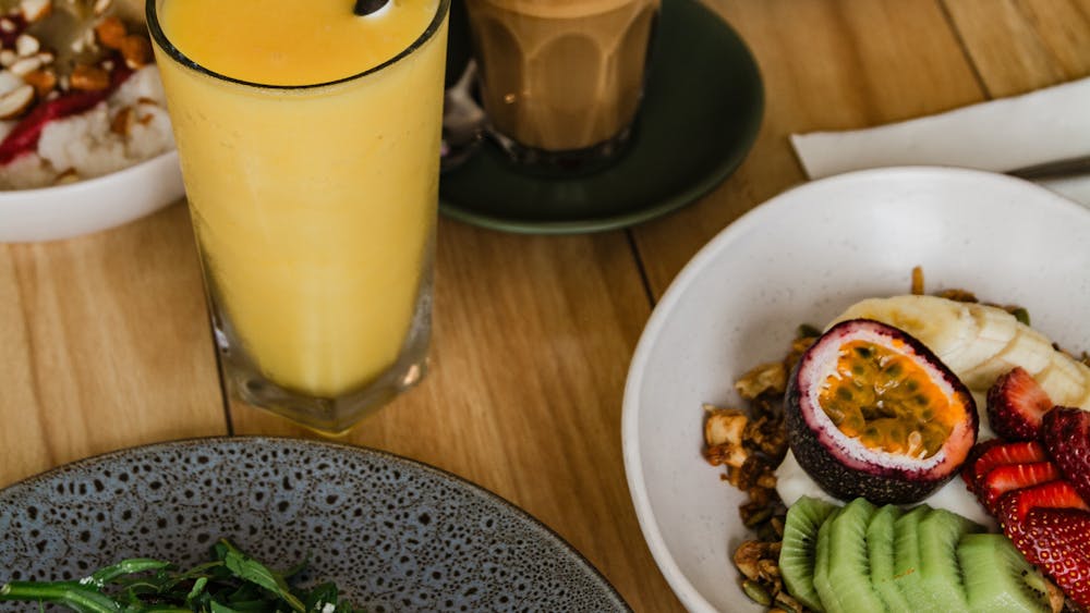 Breakfast table with - Granola, Smoothies & Coffee