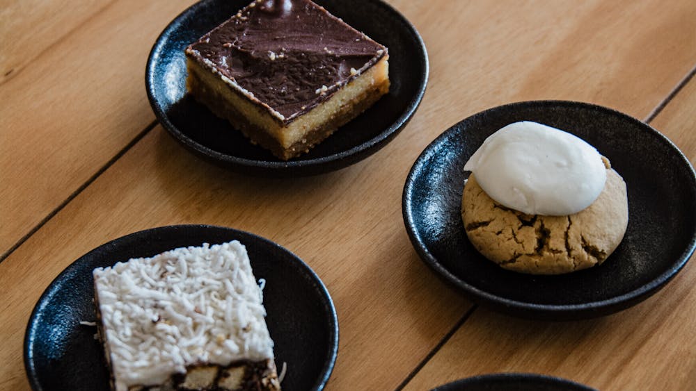 caramel slice, hedgehog, peanut butter cookie and jam drop