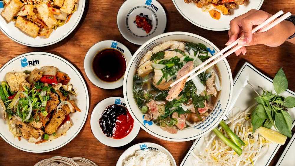 Bami Vietnamese Ballarat menu spread showing a fresh banh mi roll, pho broth bowl, and more