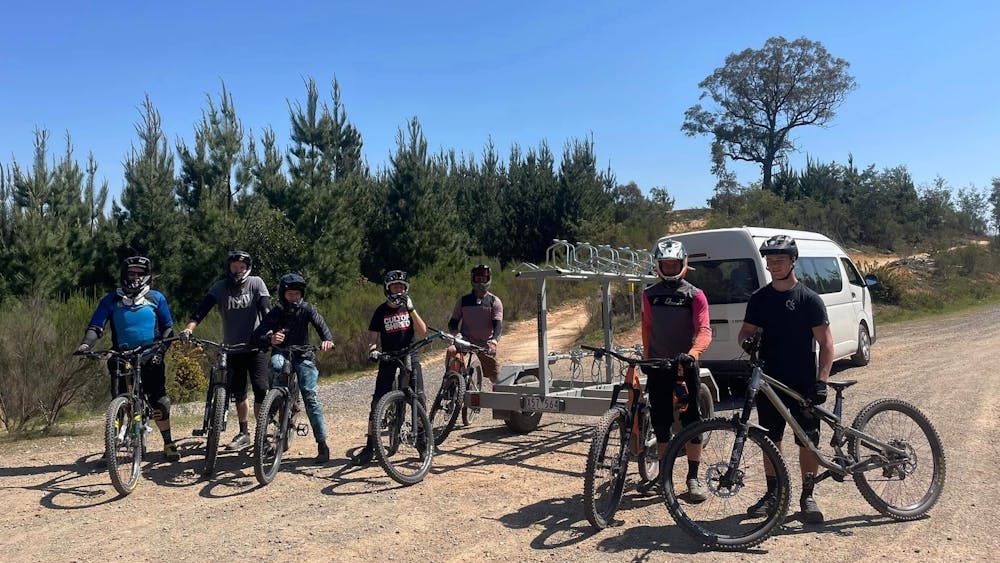 Group of riders in Creswick at the shuttle drop