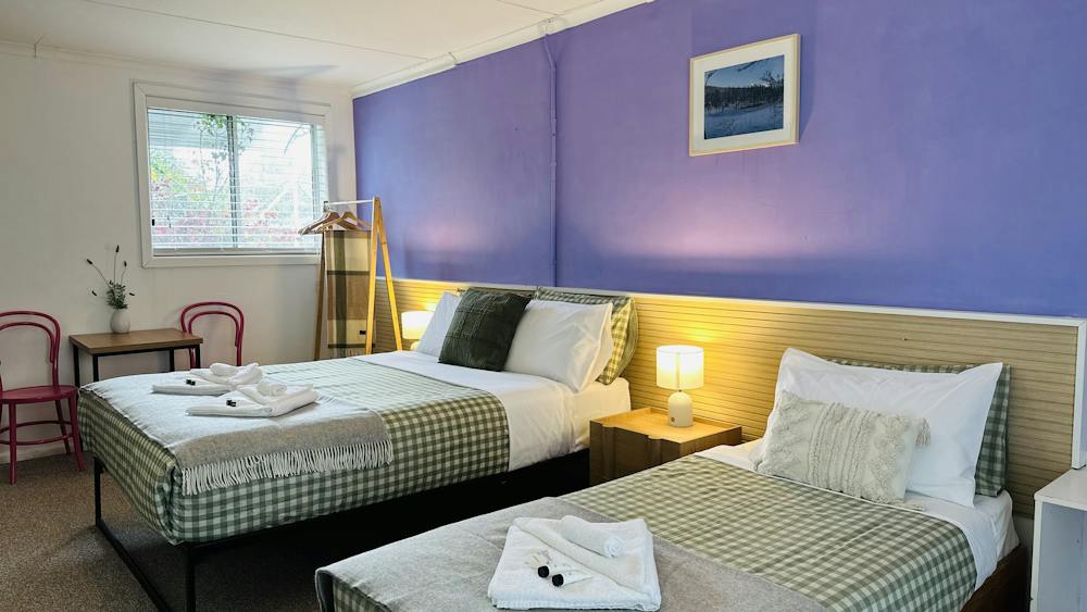 Family room with queen bed and single bed at Stonez Boutique Accommodation