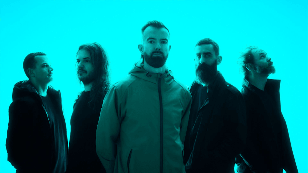 The lads from Karnivool bathed in cold blue light