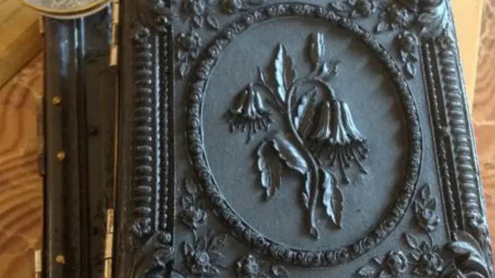 Black embossed decorative cover